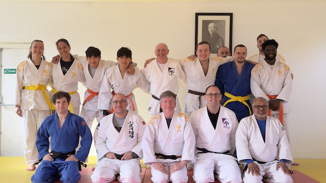colin Shearer with classmates after being presented his shodan
